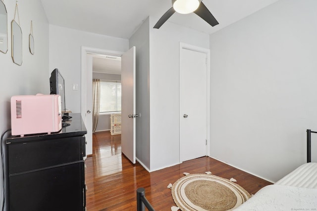 98 Herald Ave, Bridgeport, CT 06606 - bedroom featuring wood finished floors, a ceiling fan, and baseboards