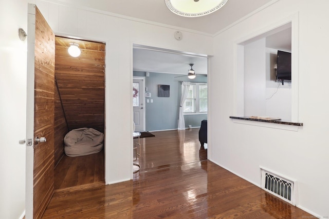 98 Herald Ave, Bridgeport, CT 06606 - hallway featuring wood finished floors, ornamental molding, and wooden walls