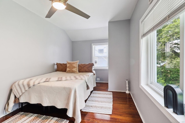 98 Herald Ave, Bridgeport, CT 06606 - bedroom featuring multiple windows, lofted ceiling, wood finished floors, a ceiling fan, and baseboards