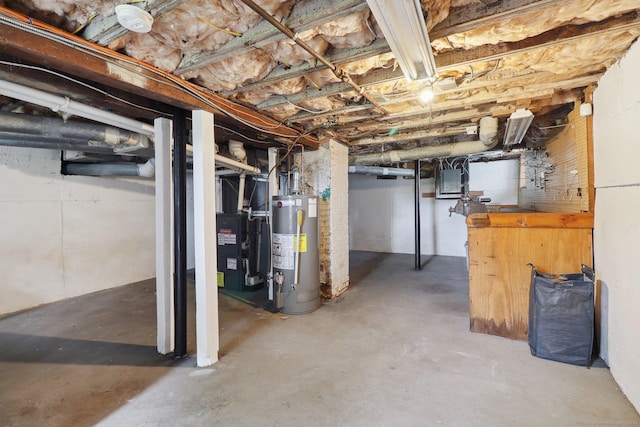 98 Herald Ave, Bridgeport, CT 06606 - unfinished basement with water heater, electric panel, and heating unit
