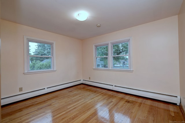 15 Edgemere Rd, Hamden, CT 06517 - spare room featuring light wood-style flooring and baseboard heating