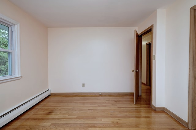 15 Edgemere Rd, Hamden, CT 06517 - spare room with baseboard heating and light wood-style flooring