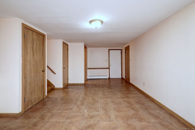 15 Edgemere Rd, Hamden, CT 06517 - unfurnished room with a baseboard heating unit and stairs