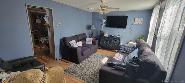 48 Greenwood St, New Haven, CT 06519 - living area with light wood-style flooring, a ceiling fan, and ornamental molding