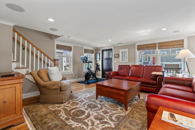 10 Point Beach Dr, Milford, CT 06460 - living area featuring crown molding, wood finished floors, stairway, and recessed lighting