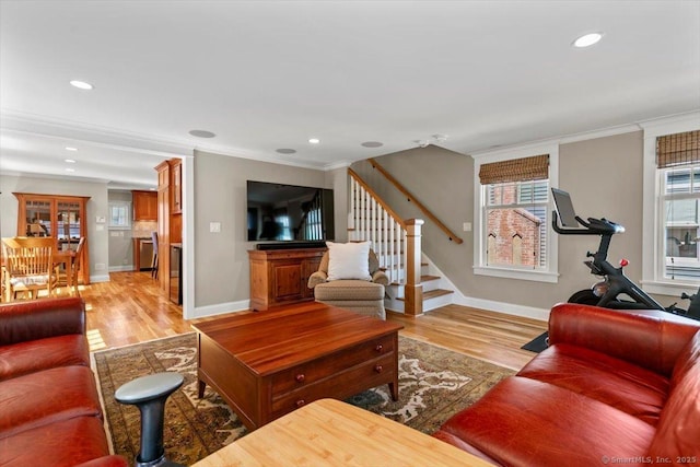 10 Point Beach Dr, Milford, CT 06460 - living room with stairs, light wood-style flooring, ornamental molding, and recessed lighting