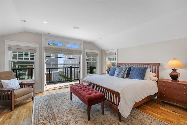 10 Point Beach Dr, Milford, CT 06460 - bedroom with lofted ceiling, access to exterior, wood finished floors, and recessed lighting