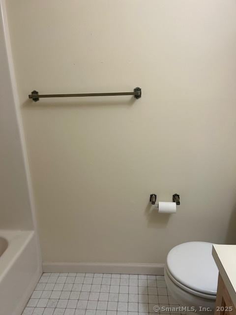 749 Long Hill Rd Unit A, Middletown, CT 06457 - bathroom with vanity, tile patterned flooring, baseboards, toilet, and a tub to relax in