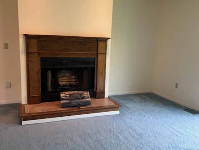 749 Long Hill Rd Unit A, Middletown, CT 06457 - detailed view of carpet, baseboards, and a fireplace with raised hearth