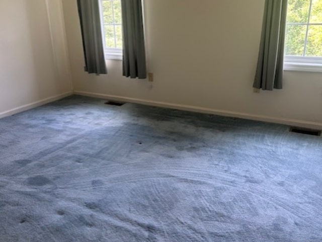 749 Long Hill Rd Unit A, Middletown, CT 06457 - unfurnished room with dark colored carpet and baseboards