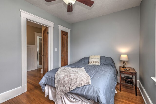 17 Norris St, Hamden, CT 06517 - bedroom featuring hardwood / wood-style floors, a textured ceiling, and a ceiling fan