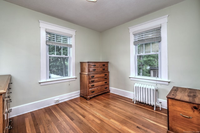 17 Norris St, Hamden, CT 06517 - bedroom with radiator and wood finished floors