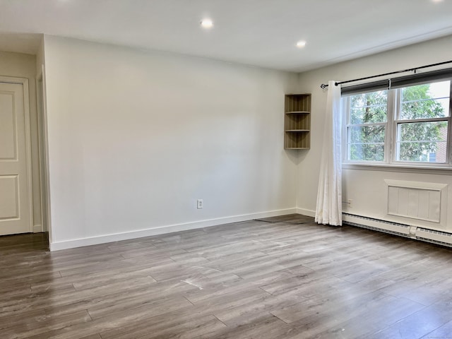 4 Belair Dr Unit 4, New Milford, CT 06776 - spare room featuring wood finished floors, recessed lighting, baseboards, and a baseboard heating unit