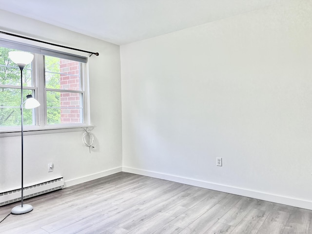 4 Belair Dr Unit 4, New Milford, CT 06776 - spare room featuring wood finished floors, healthy amount of natural light, and baseboards