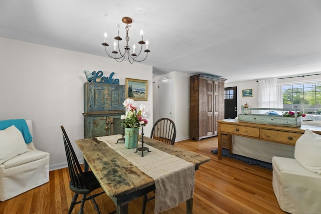 96 Long Hill Ter, New Haven, CT 06515 - dining area with a chandelier, wood finished floors, and baseboards