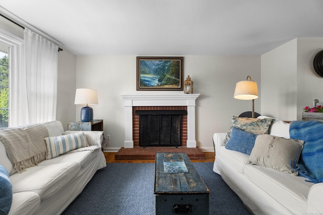 96 Long Hill Ter, New Haven, CT 06515 - living area with baseboards and a fireplace