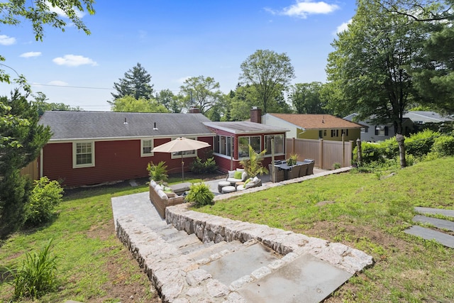 96 Long Hill Ter, New Haven, CT 06515 - back of property with a sunroom, a chimney, and a patio area