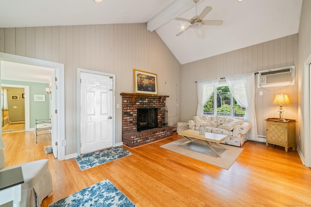 137 Roosevelt Dr, Seymour, CT 06483 - living area featuring wood finished floors, ceiling fan, a fireplace, a wall unit AC, and baseboard heating