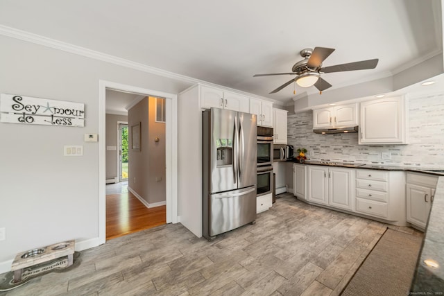 137 Roosevelt Dr, Seymour, CT 06483 - kitchen featuring stainless steel appliances, ornamental molding, a ceiling fan, under cabinet range hood, and light wood-style floors