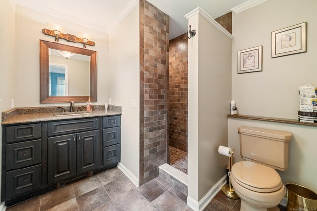 137 Roosevelt Dr, Seymour, CT 06483 - full bath featuring crown molding, a tile shower, vanity, baseboards, and toilet