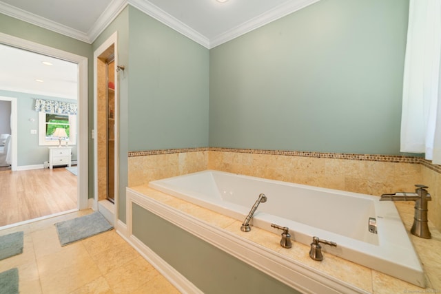 137 Roosevelt Dr, Seymour, CT 06483 - bathroom with a garden tub, ornamental molding, and tile patterned floors