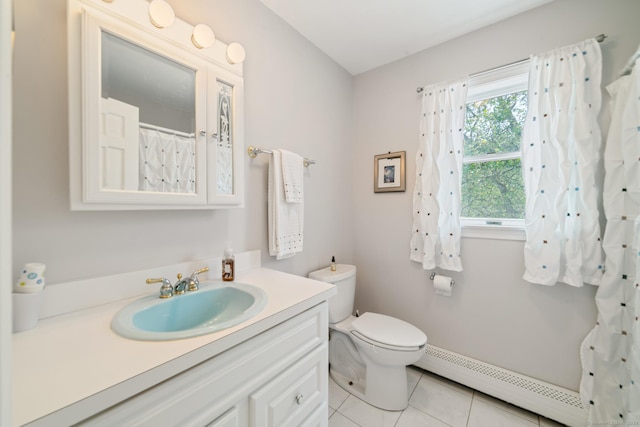 137 Roosevelt Dr, Seymour, CT 06483 - bathroom with a baseboard radiator, vanity, toilet, and tile patterned floors
