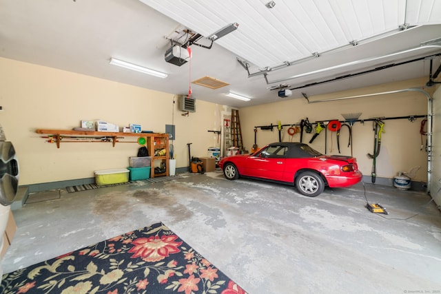 137 Roosevelt Dr, Seymour, CT 06483 - garage with a garage door opener and a heating unit