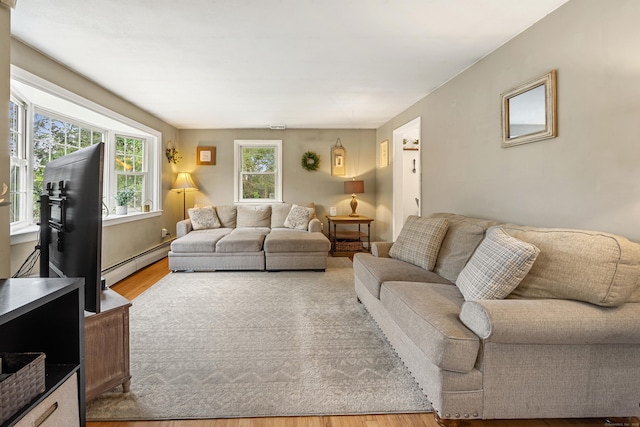 277 Tryon St, Middletown, CT 06457 - living room featuring a baseboard radiator and wood finished floors