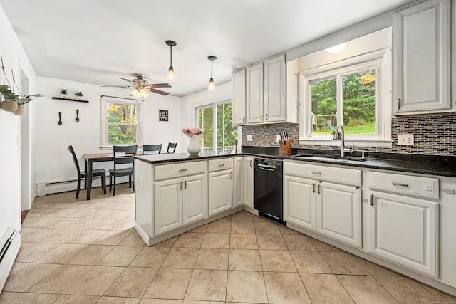 277 Tryon St, Middletown, CT 06457 - kitchen with dishwasher, a baseboard heating unit, decorative backsplash, and a peninsula