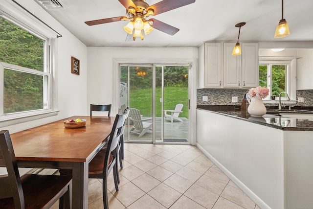 277 Tryon St, Middletown, CT 06457 - dining area with healthy amount of natural light, light tile patterned floors, and a ceiling fan