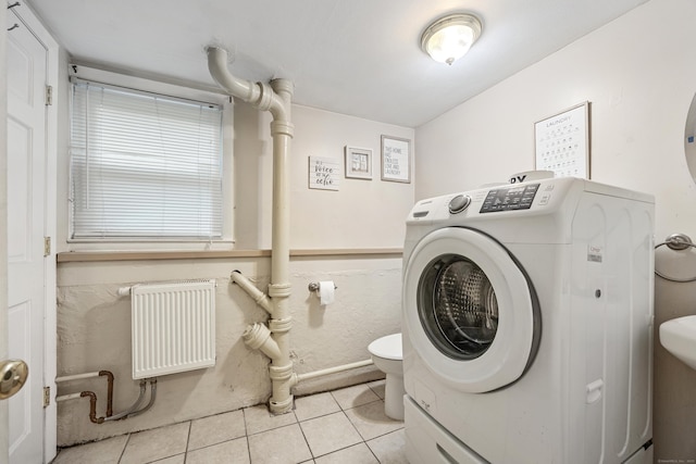 277 Tryon St, Middletown, CT 06457 - laundry room with washer / clothes dryer, radiator, and light tile patterned floors