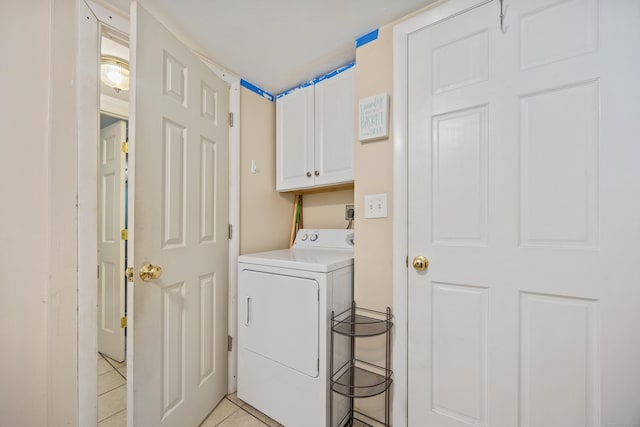 277 Tryon St, Middletown, CT 06457 - laundry room featuring washer / dryer, cabinet space, and light tile patterned flooring