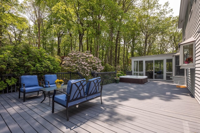 305 Thayer Pond Rd, Wilton, CT 06897 - deck with a hot tub, an outdoor living space, and a sunroom