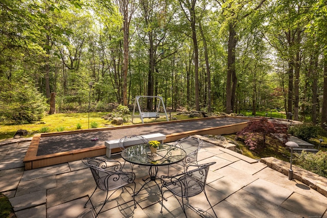 305 Thayer Pond Rd, Wilton, CT 06897 - view of patio featuring a forest view
