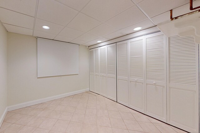 305 Thayer Pond Rd, Wilton, CT 06897 - finished basement with recessed lighting, baseboards, and a paneled ceiling