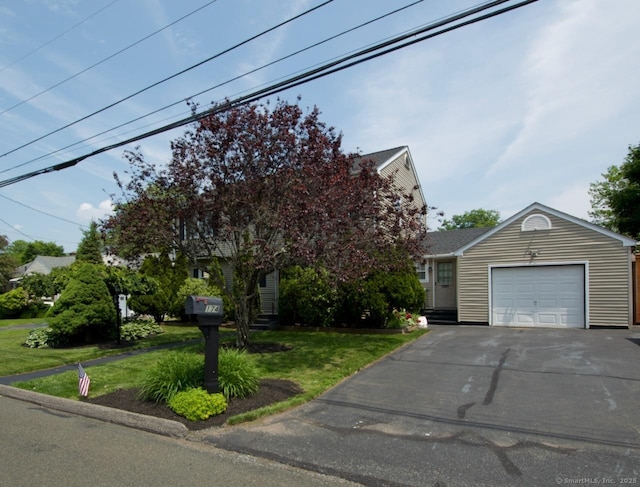 174 Round Hill Rd, Meriden, CT 06450 - view of property hidden behind natural elements featuring driveway, a front lawn, and an attached garage