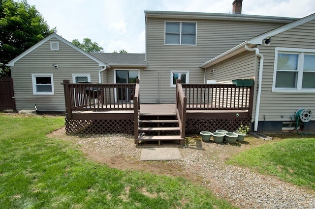 174 Round Hill Rd, Meriden, CT 06450 - back of property with a deck, a chimney, and a lawn
