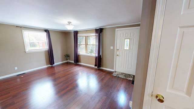 174 Round Hill Rd, Meriden, CT 06450 - foyer featuring dark wood-style flooring, baseboards, and crown molding