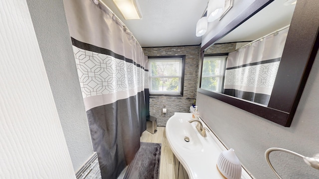 174 Round Hill Rd, Meriden, CT 06450 - bathroom with vanity, curtained shower, and wood finished floors