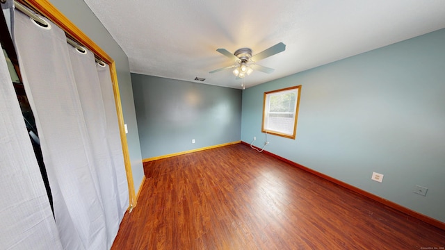 174 Round Hill Rd, Meriden, CT 06450 - unfurnished bedroom with wood finished floors, baseboards, and ceiling fan