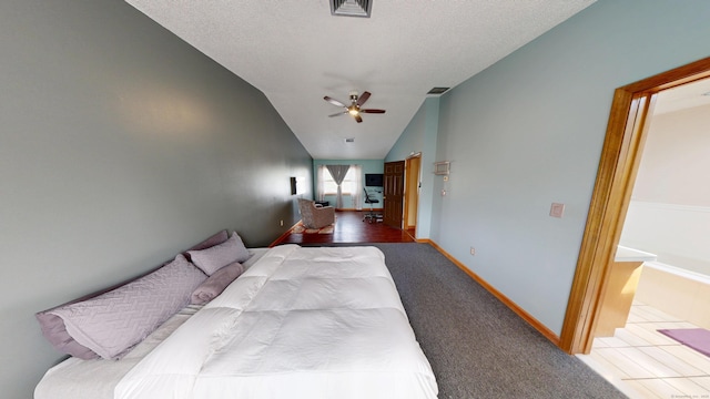 174 Round Hill Rd, Meriden, CT 06450 - bedroom with vaulted ceiling, carpet, baseboards, a textured ceiling, and a ceiling fan