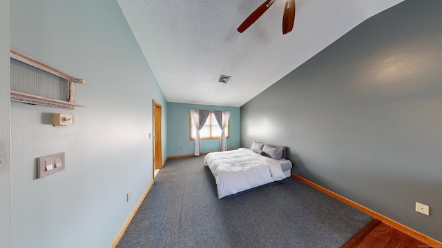 174 Round Hill Rd, Meriden, CT 06450 - bedroom with vaulted ceiling, baseboards, and a ceiling fan