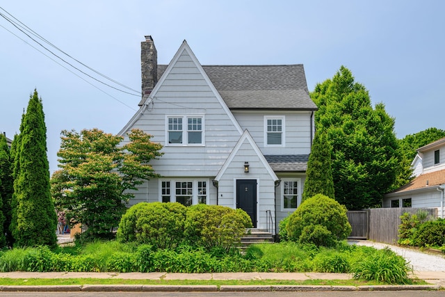 61 Quintard Ave, Norwalk, CT 06854 - view of front facade featuring a shingled roof and a chimney