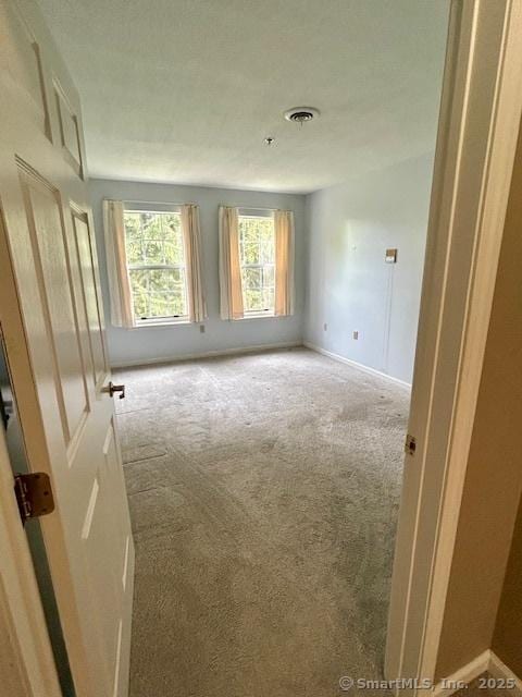 625 Palisado Ave Apt 206, Windsor, CT 06095 - unfurnished room with carpet flooring and baseboards
