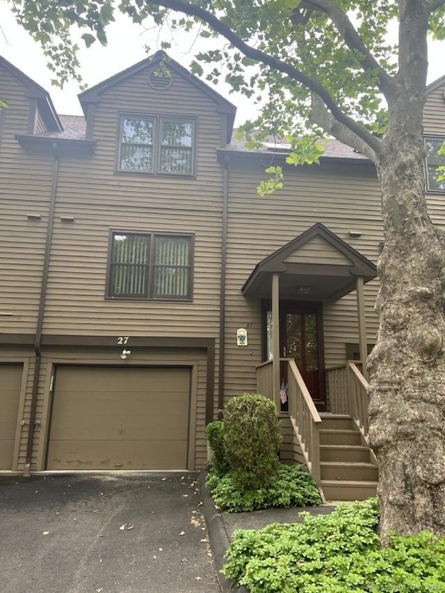 27 Rolling Ridge Rd Unit 27, Monroe, CT 06468 - townhome / multi-family property featuring a garage and asphalt driveway