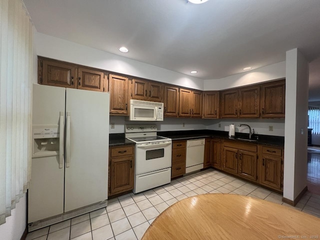 27 Rolling Ridge Rd Unit 27, Monroe, CT 06468 - kitchen with white appliances, dark countertops, light tile patterned floors, and recessed lighting