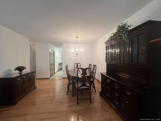 27 Rolling Ridge Rd Unit 27, Monroe, CT 06468 - dining room with a chandelier and light wood-style flooring