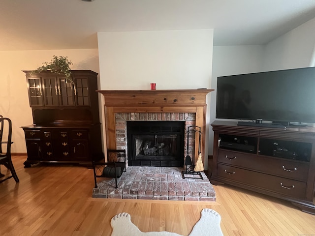 27 Rolling Ridge Rd Unit 27, Monroe, CT 06468 - living room featuring wood finished floors and a fireplace