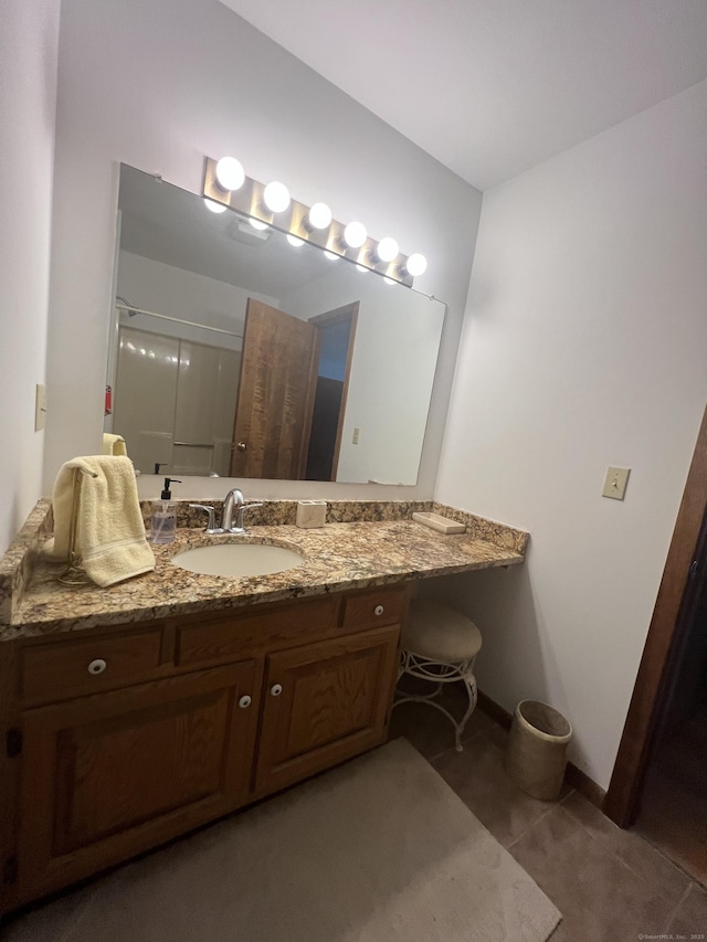 27 Rolling Ridge Rd Unit 27, Monroe, CT 06468 - bathroom featuring vanity, tile patterned flooring, and a shower with door