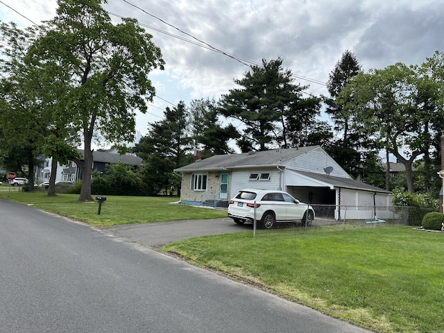 130 Judd Ave, New Britain, CT 06051 - view of front of property with a chimney and asphalt driveway